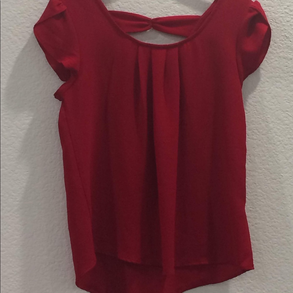 Red blouse with three bows